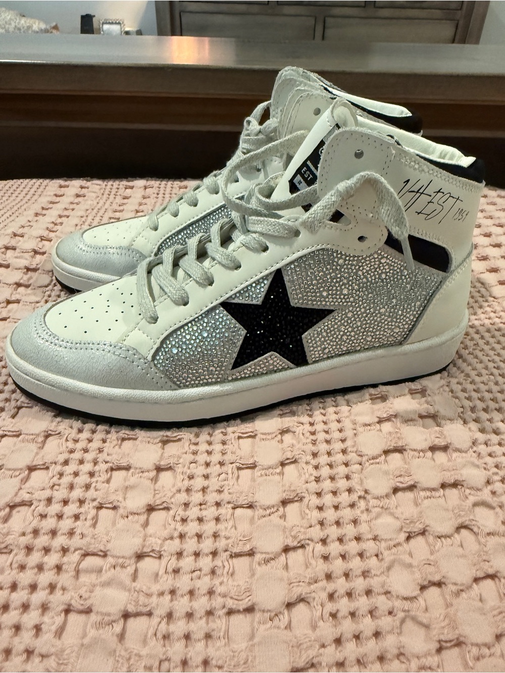 Women's White High-Top Sneaker with Black Star Accent